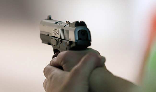 Man opens fire, robs techie at ATM