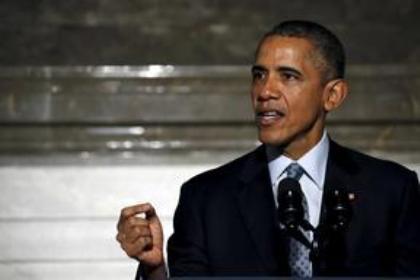 Obama welcomes Iraq refugee as new U.S. citizen