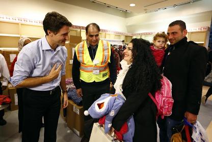 ‘Welcome home’: Canadian PM to Syrian refugees in Toronto
