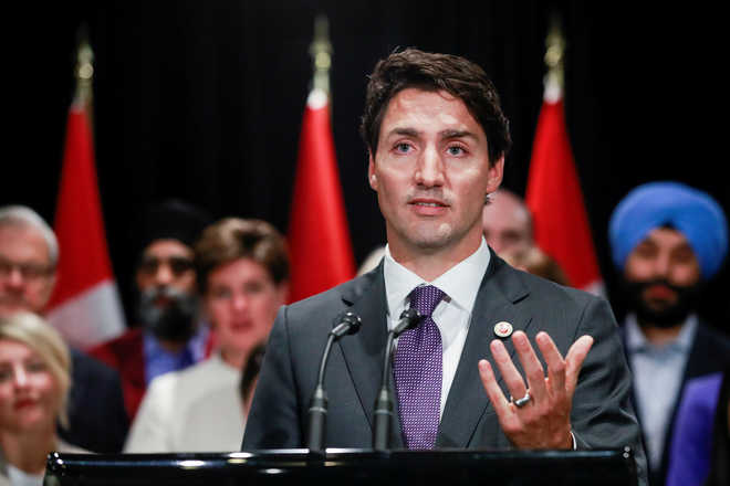 Canada’s Trudeau welcomes refugees; US-bound passengers turned away
