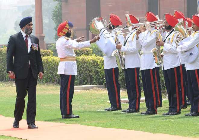 Amid confusion, Sajjan finally given guard of honour