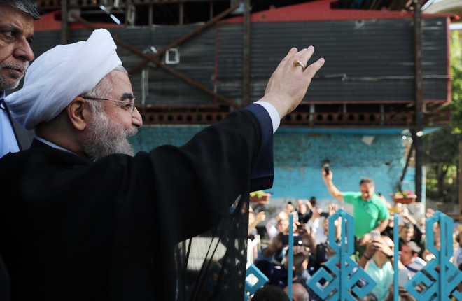 Iran presidential poll: Hassan Rouhani on course for second term