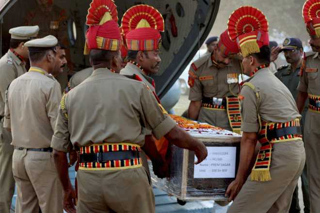 BSF trooper cremated in UP after Yogi pacifies family