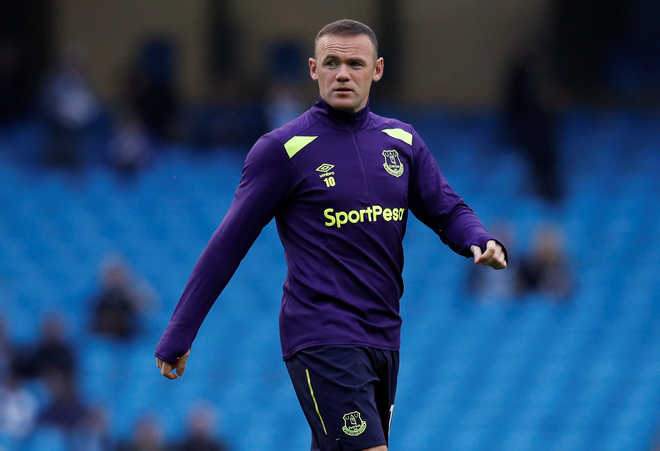 Rooney calls time on England career despite being recalled