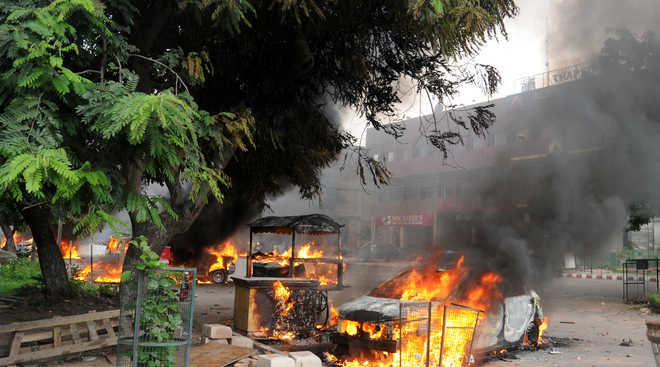 Uneasy calm prevails a day after mayhem in Panchkula