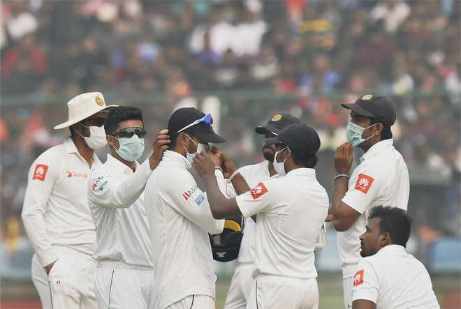 Delhi Test: Mask-wearing Lankans force India to declare at 536/7 on smog-hit day