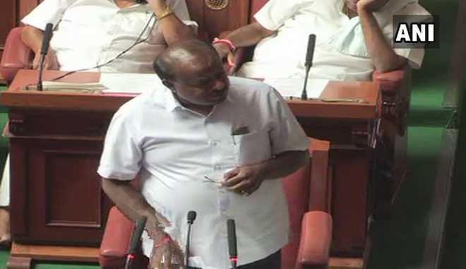 Kumaraswamy wins trust vote as BJP walks out of Karnataka Assembly