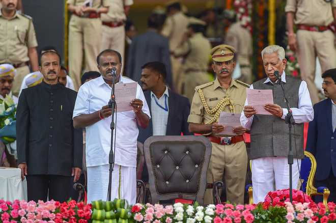 Kumaraswamy takes oath as Karnataka CM; top Oppn attend ceremony