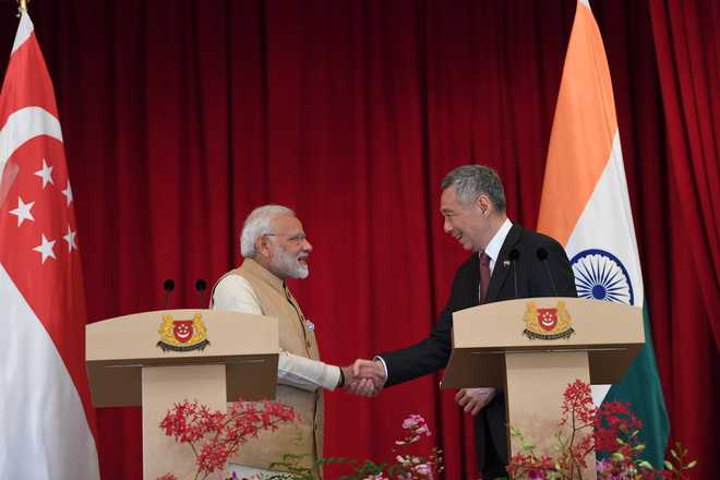 India, Singapore agree to boost trade, sign 8 pacts