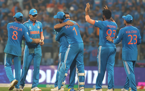 Virat Kohli’s remarkable century and an outstanding performance by Mohammed Shami with seven wickets propelled India into their fourth World Cup final